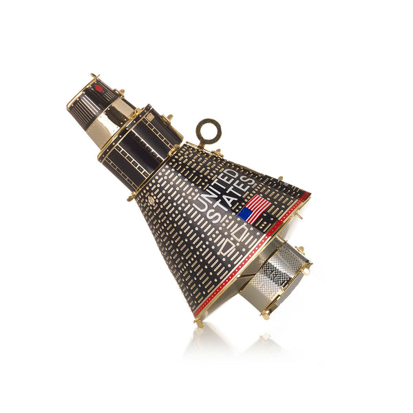 Handcrafted Friendship 7 Space Capsule Christmas ornament by The London Christmas Company, celebrating NASA’s historic Mercury mission with intricate 24-carat gold detailing for holiday décor.