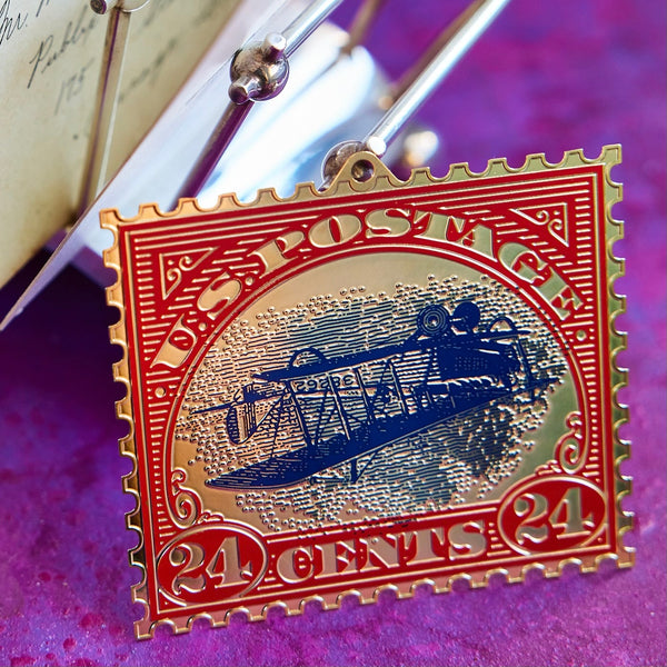 Inverted Jenny Stamp Christmas Ornament - USPS Replica by The London Christmas Company - Iconic U.S. Airmail Collectible Keepsake. Solid Brass and 24k Gold.