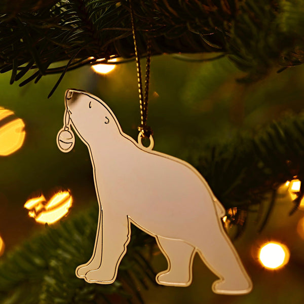 Handcrafted 24-carat gold Polar Bear ornament in a Christmas Tree, featuring The London Christmas Company logo, symbolizing luxury and elegance in holiday decor.